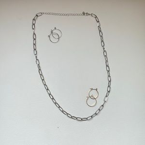 silver necklace with complementary silver and gold earrings